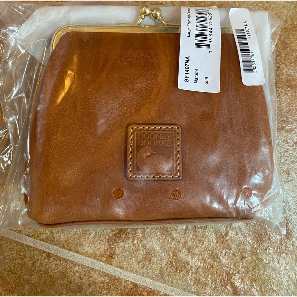 Dooney and Bourke leather coin purse new with tags.
